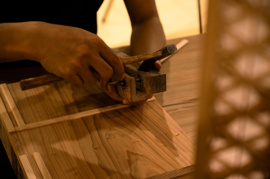 Craftsman building handmade furniture in a workshop